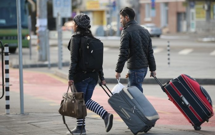 viaggiatori valige