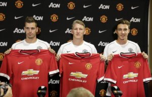 Manchester United introduces three new signings: Morgan Schneiderlin (L-R), Bastian Schweinsteiger , and Matteo Darmian, at a news conference in Bellevue, Washington July 15, 2015. REUTERS/Jason Redmond