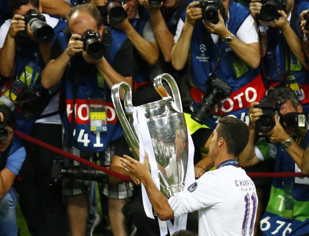 Football Soccer - Real Madrid v Atletico Madrid - UEFA Champions League Final - San Siro Stadium, Milan, Italy - 28/5/16 Real Madrid's Cristiano Ronaldo celebrates with the trophy after winning the UEFA Champions League. REUTERS/Tony Gentile